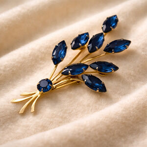 Vintage Blue Rhinestone Spray Brooch | Mid Century Sapphire Gold Navette Pin